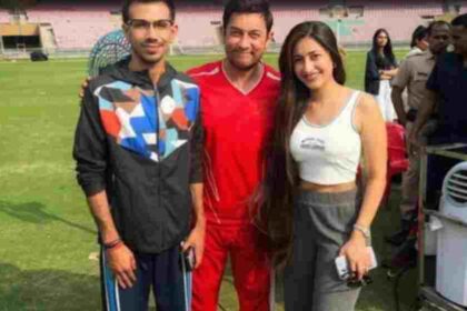 Before the KKR vs. RR match, Aamir Khan poses with Dhanashree Verma and Yuzvendra Chahal and beams broadly.